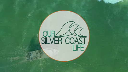 Our Silver Coast Life logo over a photo of the sea and a fishing vessel